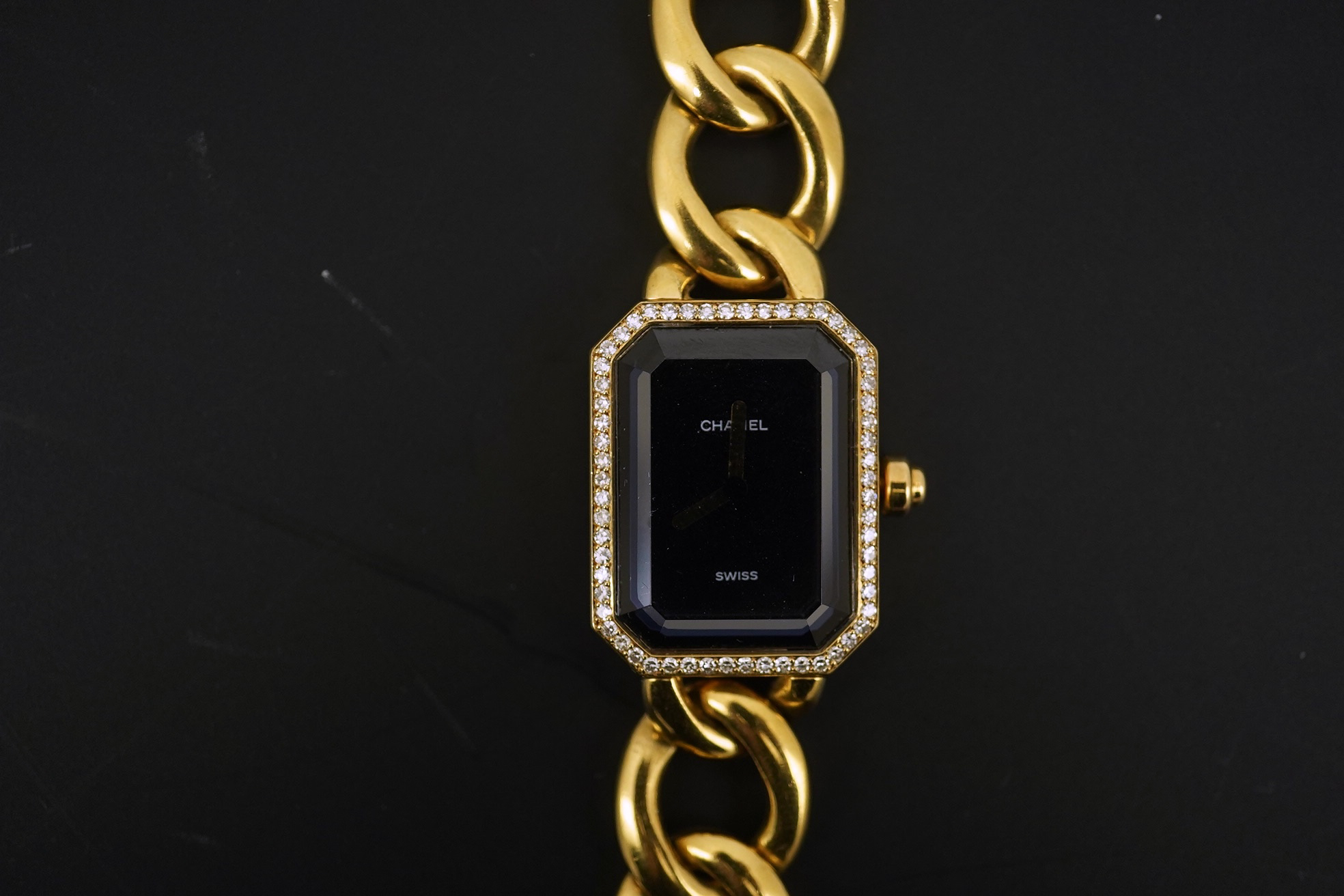 A lady's modern 18ct gold and diamond set Chanel quartz wrist watch, on an 18ct gold Chanel oval link bracelet